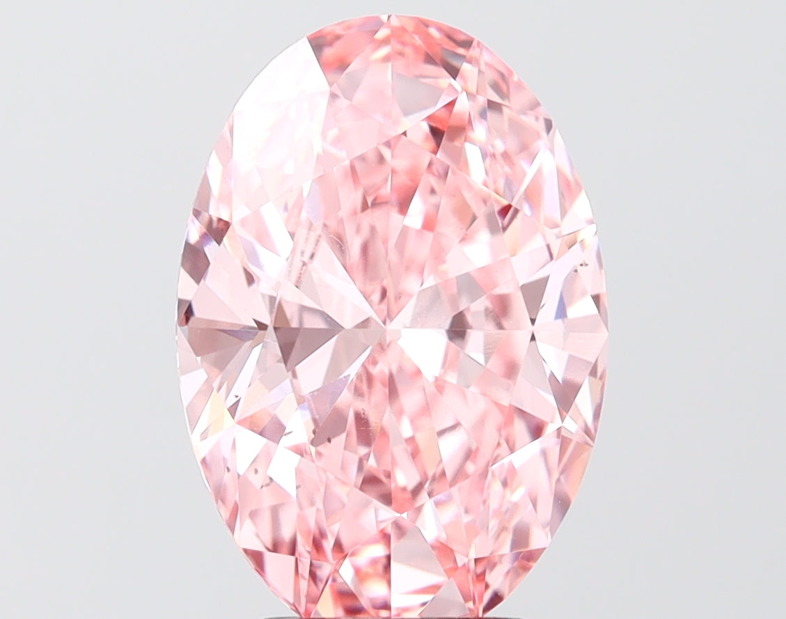 4.07 carat fancy vivid pink oval lab grown diamond VS2 clarity