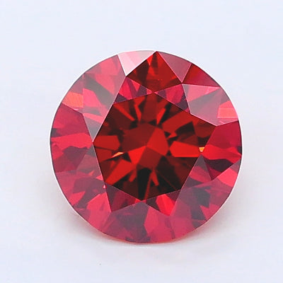 0.91 carat fancy vivid brownish orange round lab grown diamond VVS1 clarity