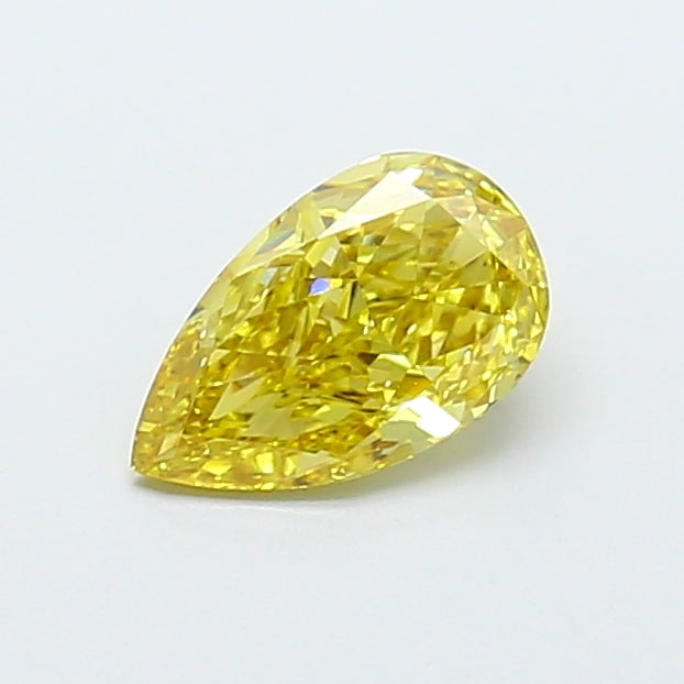 0.98 carat fancy vivid yellow pear lab grown diamond VVS2 clarity