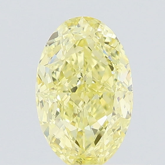 0.57 carat fancy yellow oval lab grown diamond VS1 clarity