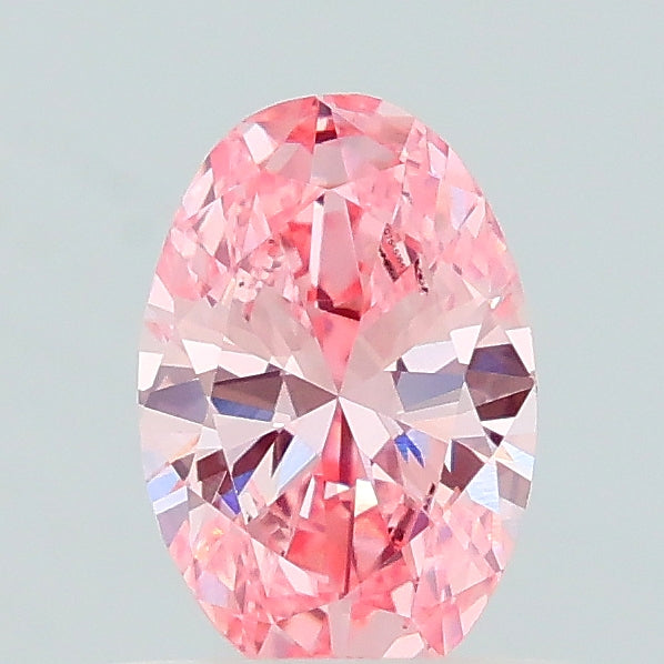 0.53 carat fancy intense pink oval lab grown diamond VVS2 clarity