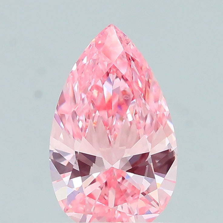 0.47 carat fancy vivid pink pear lab grown diamond VVS2 clarity