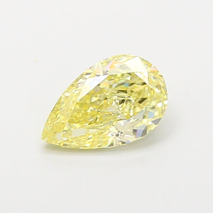0.94 carat fancy yellow pear lab grown diamond VVS2 clarity