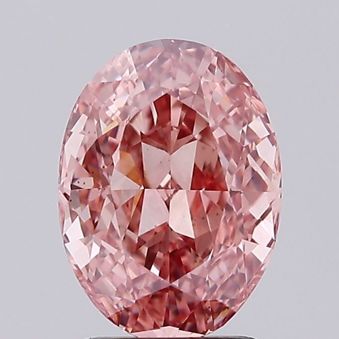 1.50 carat fancy vivid brownish pink oval lab grown diamond VS1 clarity