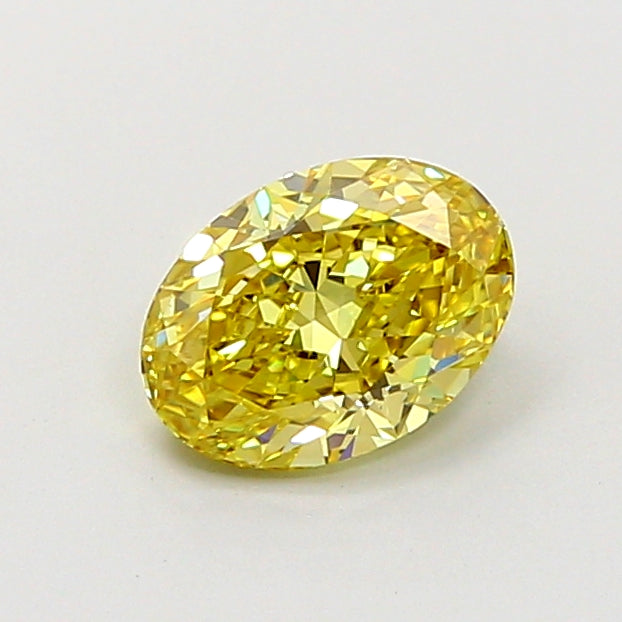 0.92 carat fancy intense yellow oval lab grown diamond VS1 clarity