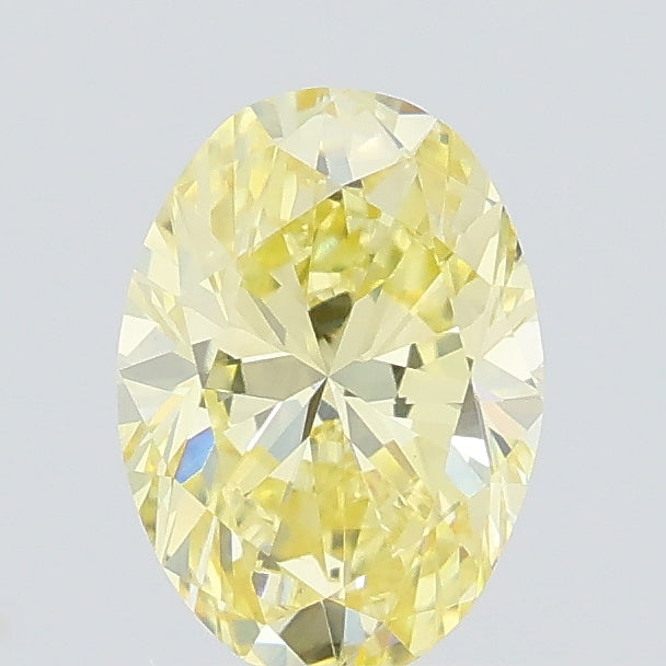 0.62 carat fancy yellow oval lab grown diamond VS1 clarity