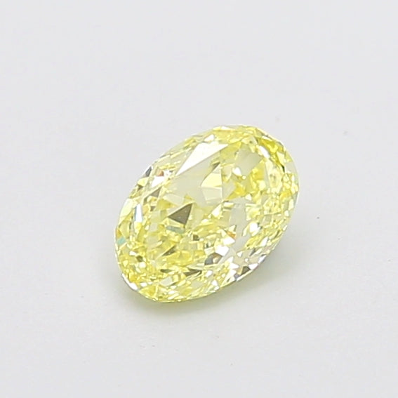 0.61 carat fancy yellow oval lab grown diamond VS1 clarity