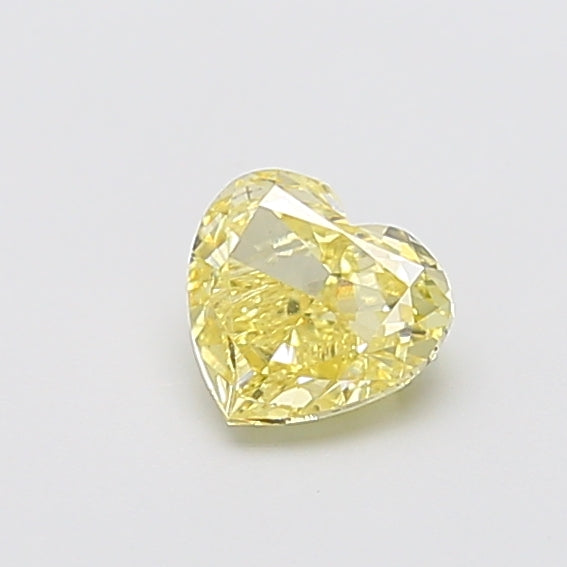 0.74 carat fancy yellow heart lab grown diamond VS1 clarity