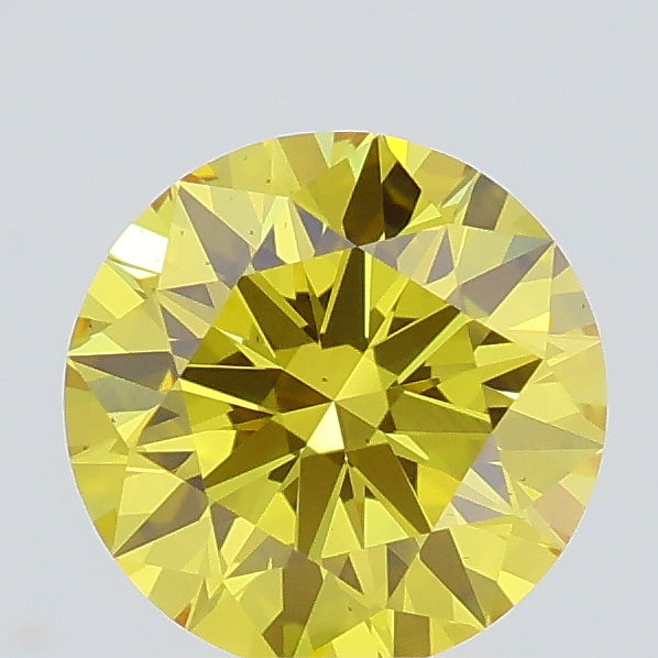 0.59 carat fancy intense brownish yellow round lab grown diamond VS2 clarity