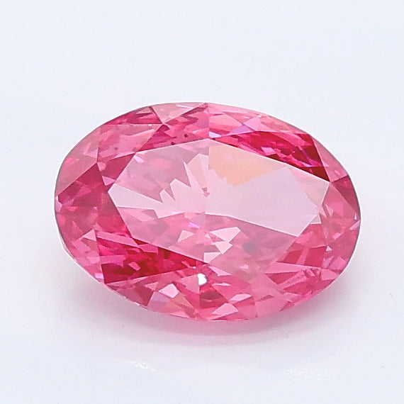 0.89 carat fancy vivid pink oval lab grown diamond VS1 clarity