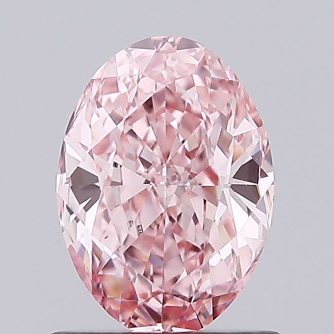 0.98 carat fancy vivid pink oval lab grown diamond VS1 clarity