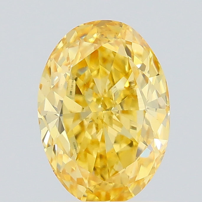 0.79 carat fancy intense yellow oval lab grown diamond SI1 clarity