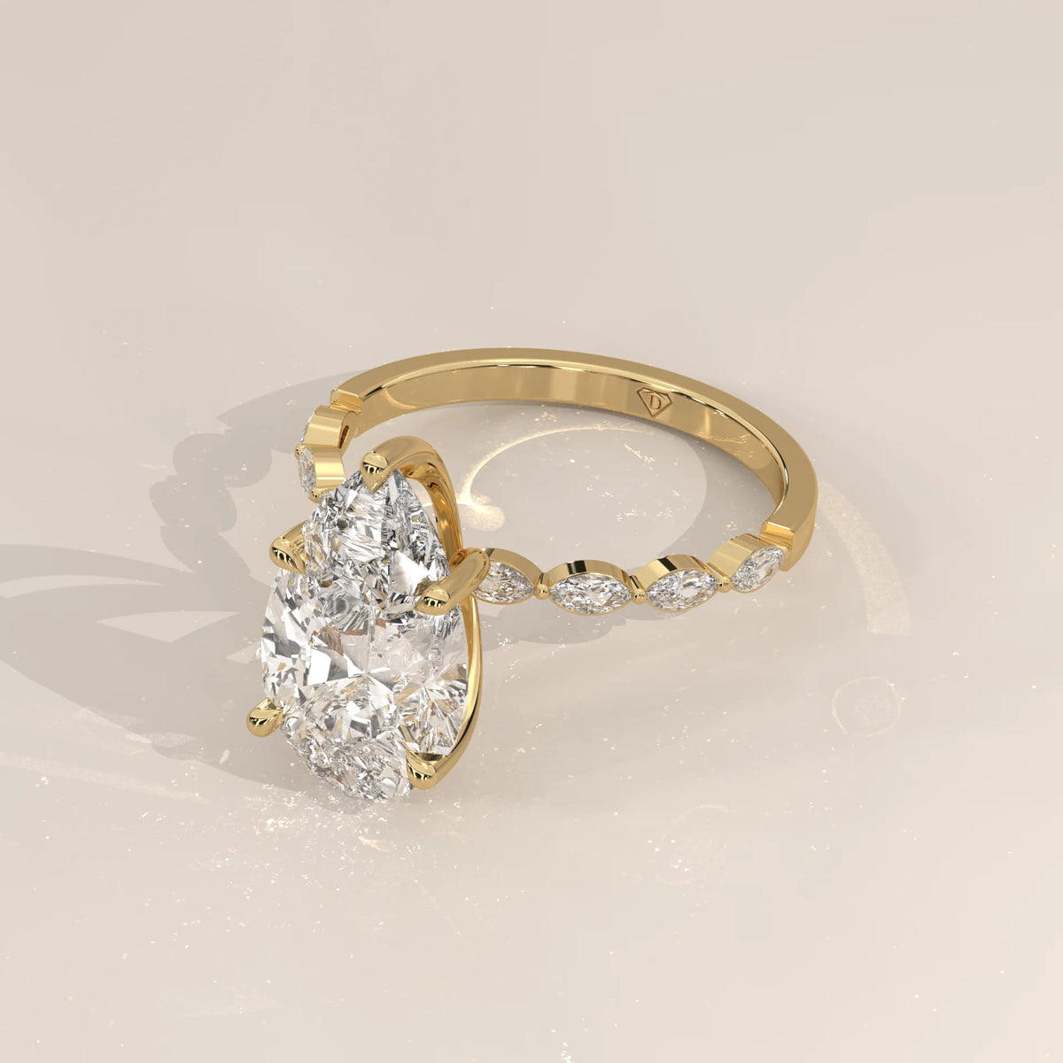 Stlea 5 Carat Pear Lab Grown Diamond Ring, Bezel Marquise Band in yellow gold, shown from the side.