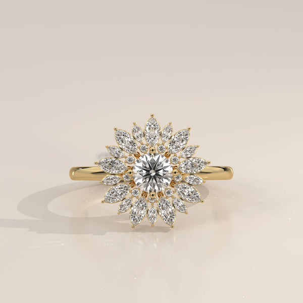 A yellow gold ring with a central diamond surrounded by marquise and round diamonds.