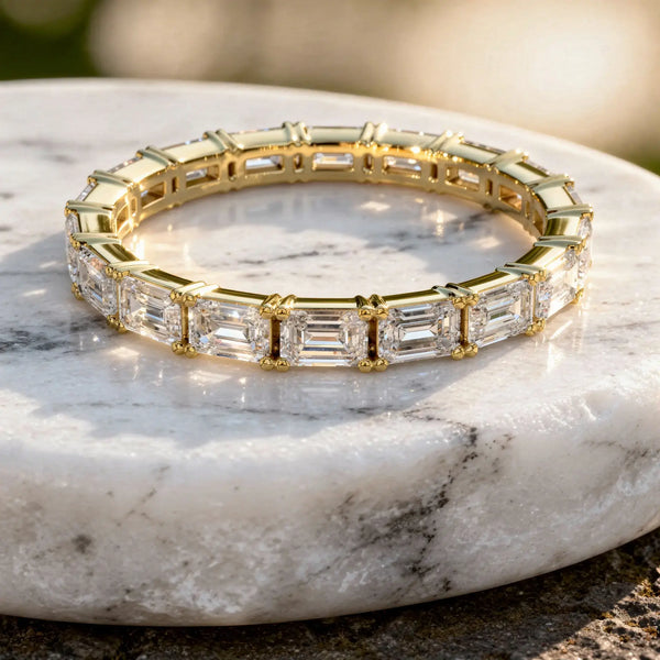 Flat Lay: Emerald Cut Diamond Tennis Bracelet with Prong Setting in 14k Yellow Gold - Lab Grown - Driona Jewels