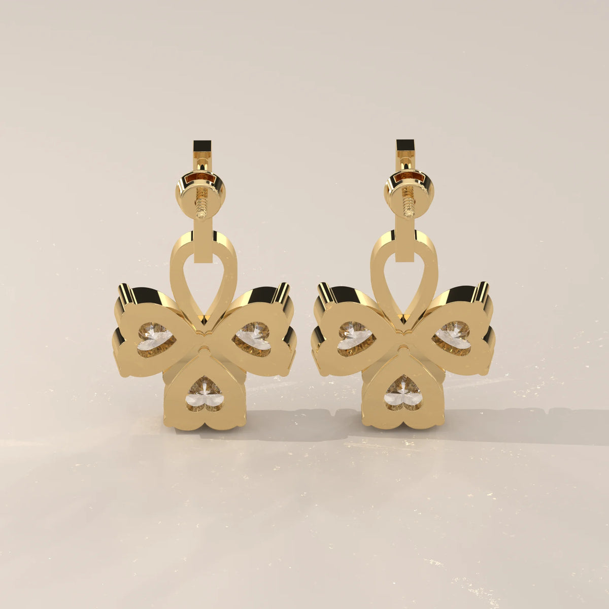 Three Heart Lab Grown Diamond Clover Drop Earrings with Pave Bar in yellow gold, photographed head-on.