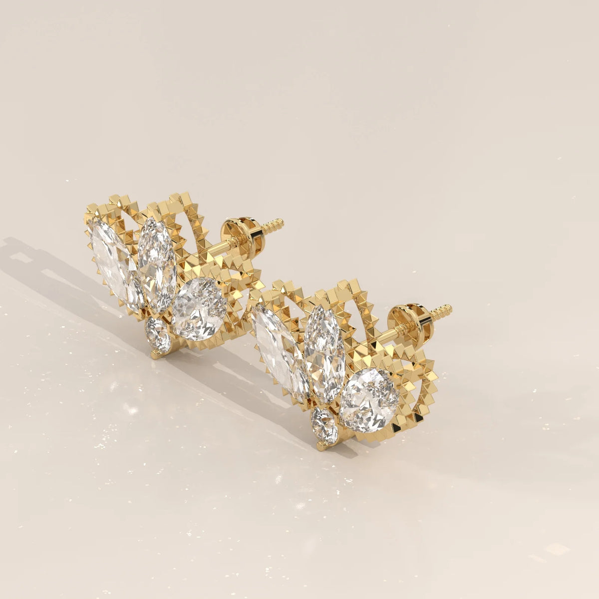 Three Marquise Lotus Fan Lab Grown Diamond Studs with Round Base in yellow gold, shown on a plain background.