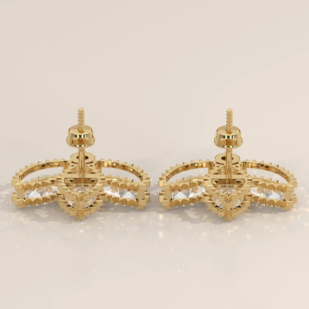 Three Marquise Lotus Fan Lab Grown Diamond Studs with Round Base in yellow gold, studio photograph on a plain background.