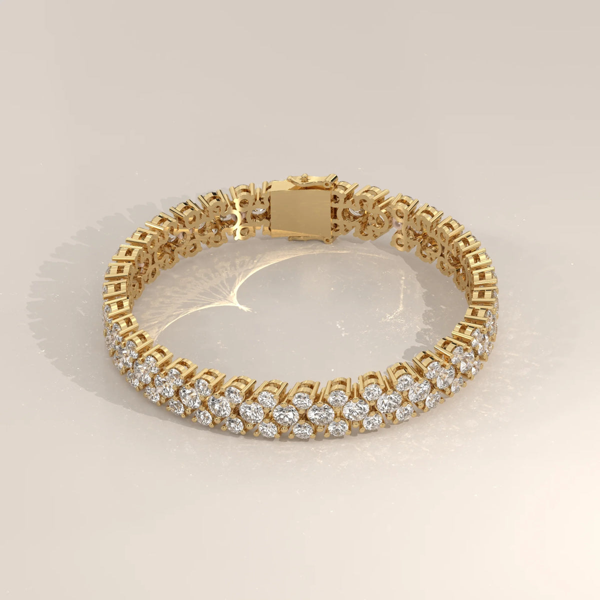 Three Row Round Lab Grown Diamond Cluster Tennis Bracelet in yellow gold, shown at an angle.
