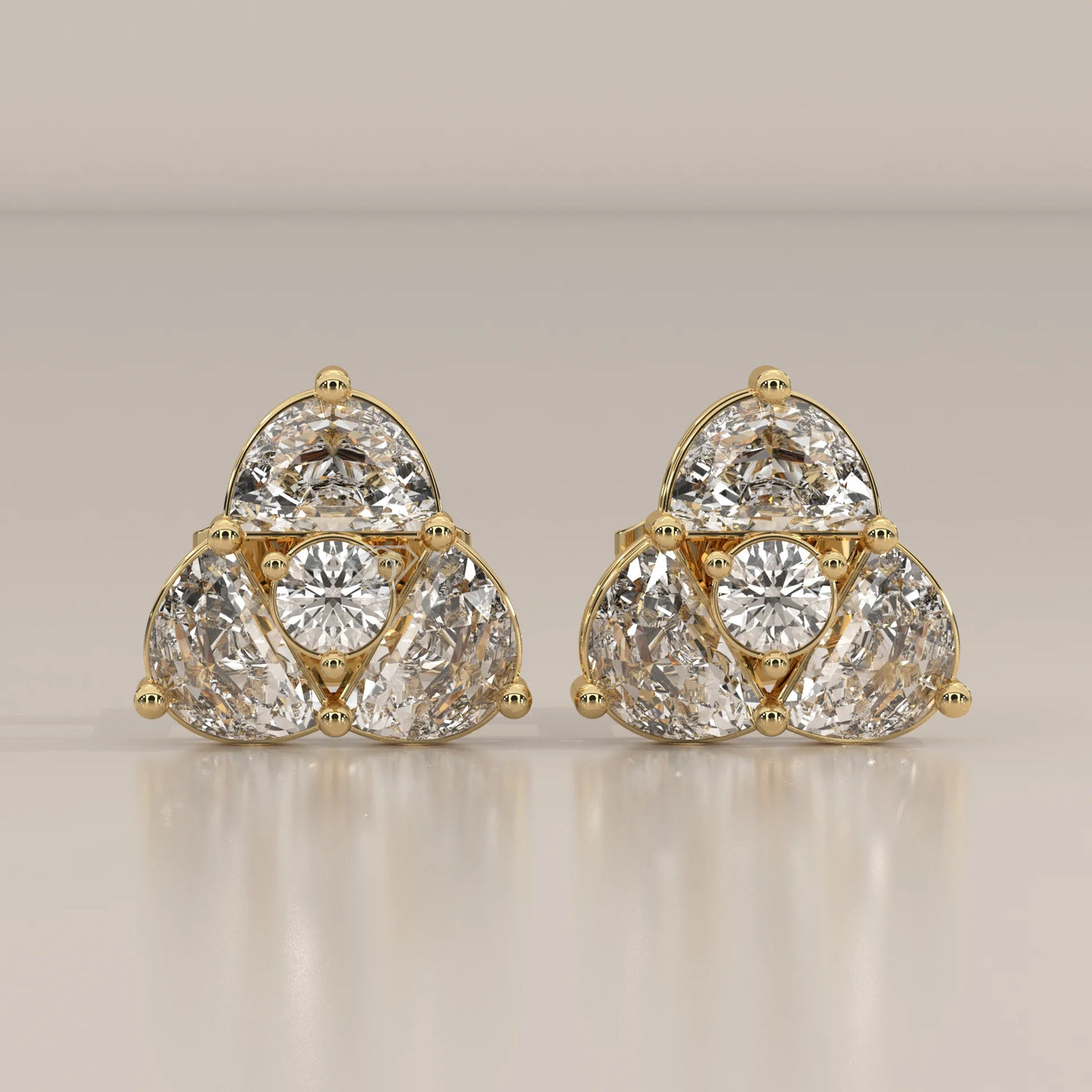 Front View: Round Diamond Stud Earrings with Three-Stone Setting in Yellow Gold – Lab Grown – Driona Jewels
