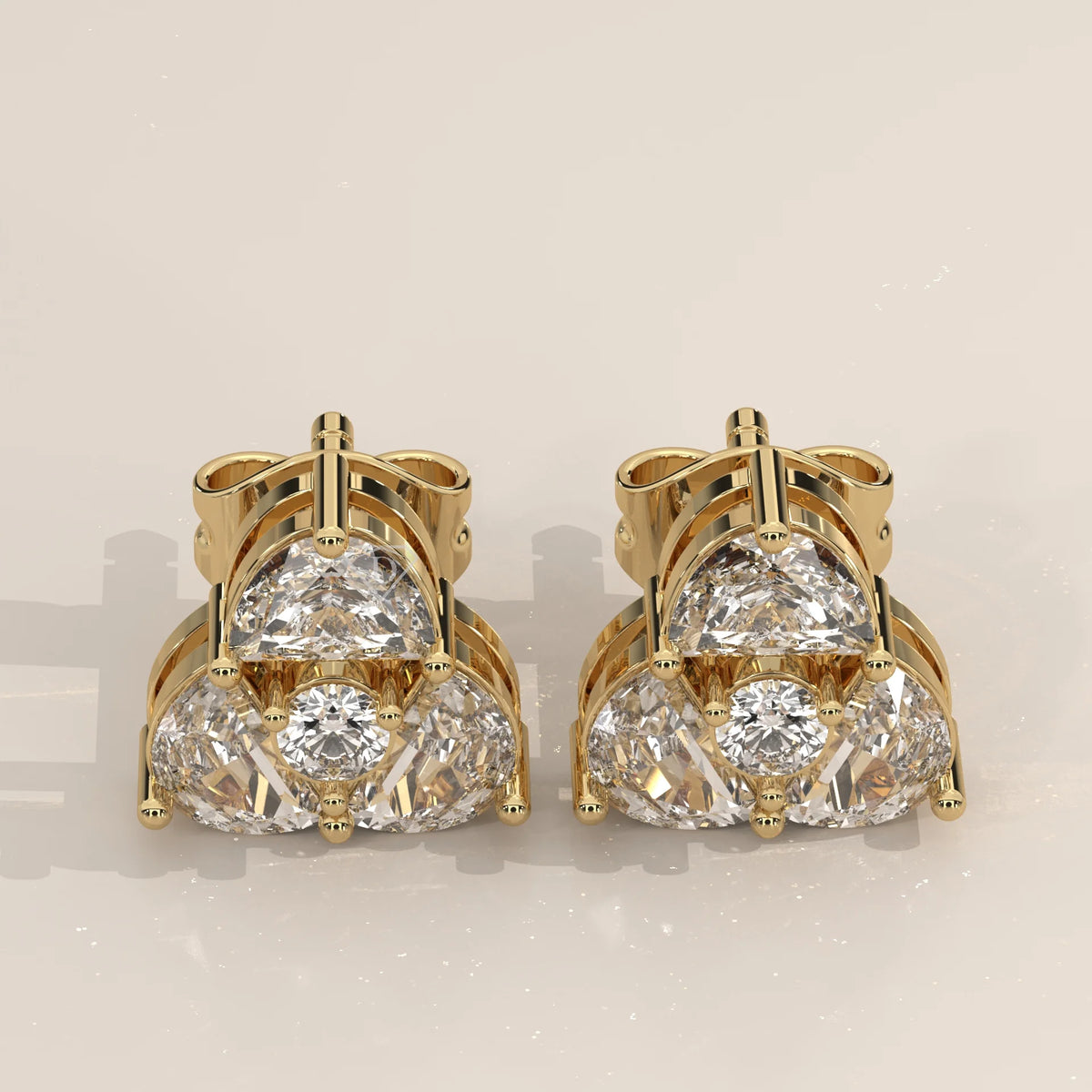 Pair Front View: Round Diamond Stud Earrings with Three-Stone Setting in Yellow Gold – Lab Grown – Driona Jewels
