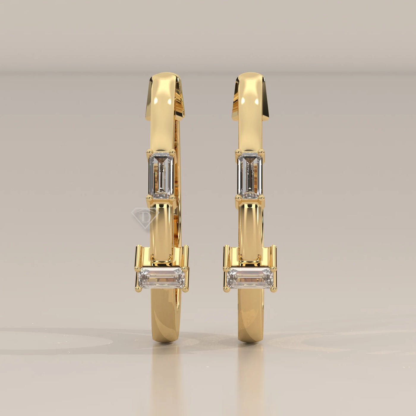 Front View: Emerald Cut Diamond Huggie Hoop Earrings with Three-Stone Setting in Yellow Gold – Lab Grown – Driona Jewels