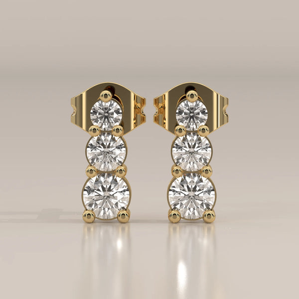 Front View: Round Diamond Stud Earrings with Three-Stone Setting in Yellow Gold – Lab Grown – Driona Jewels