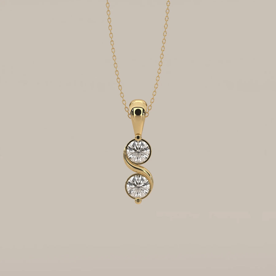 Two Stone Bezel Round Lab Grown Diamond Pendant with S Curve in yellow gold, shown from the front.