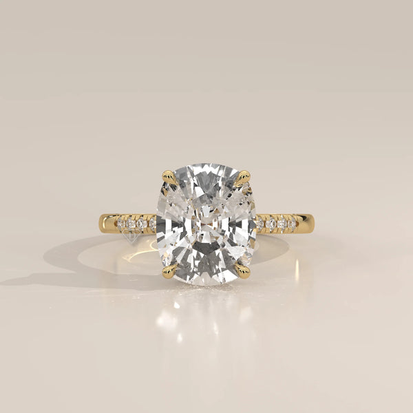 Venessa 5 Carat Cushion Lab Grown Diamond Ring, Petite Pave Shoulders in yellow gold, photographed head-on.