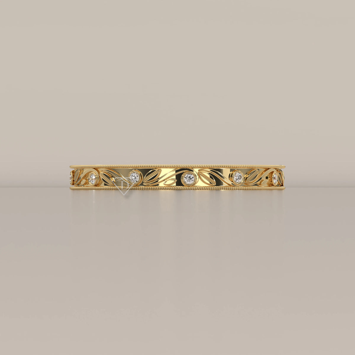 Vintage Engraved Band with Bezel Set Diamond Stations in yellow gold, photographed head-on.