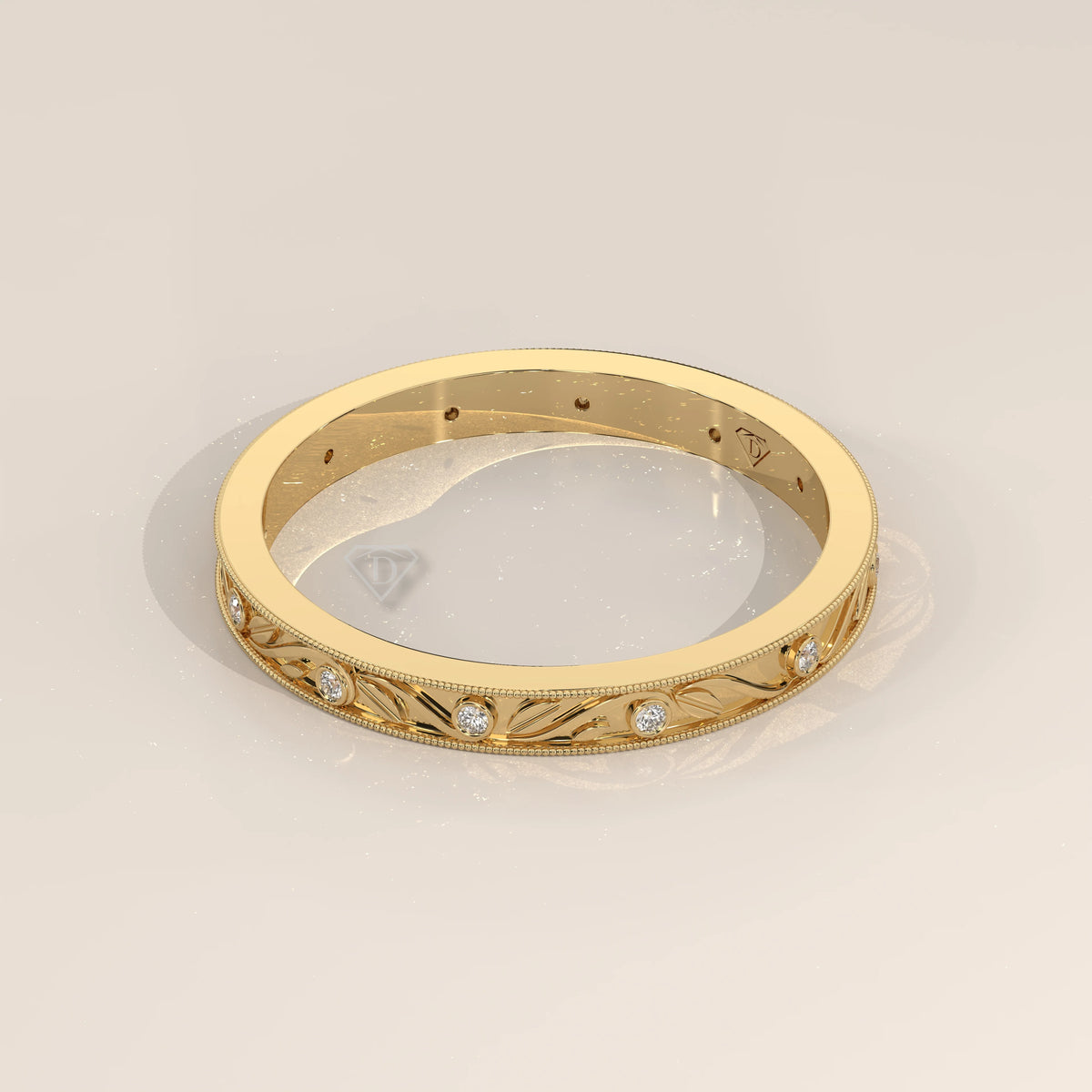Vintage Engraved Band with Bezel Set Diamond Stations in yellow gold, shown from the side.