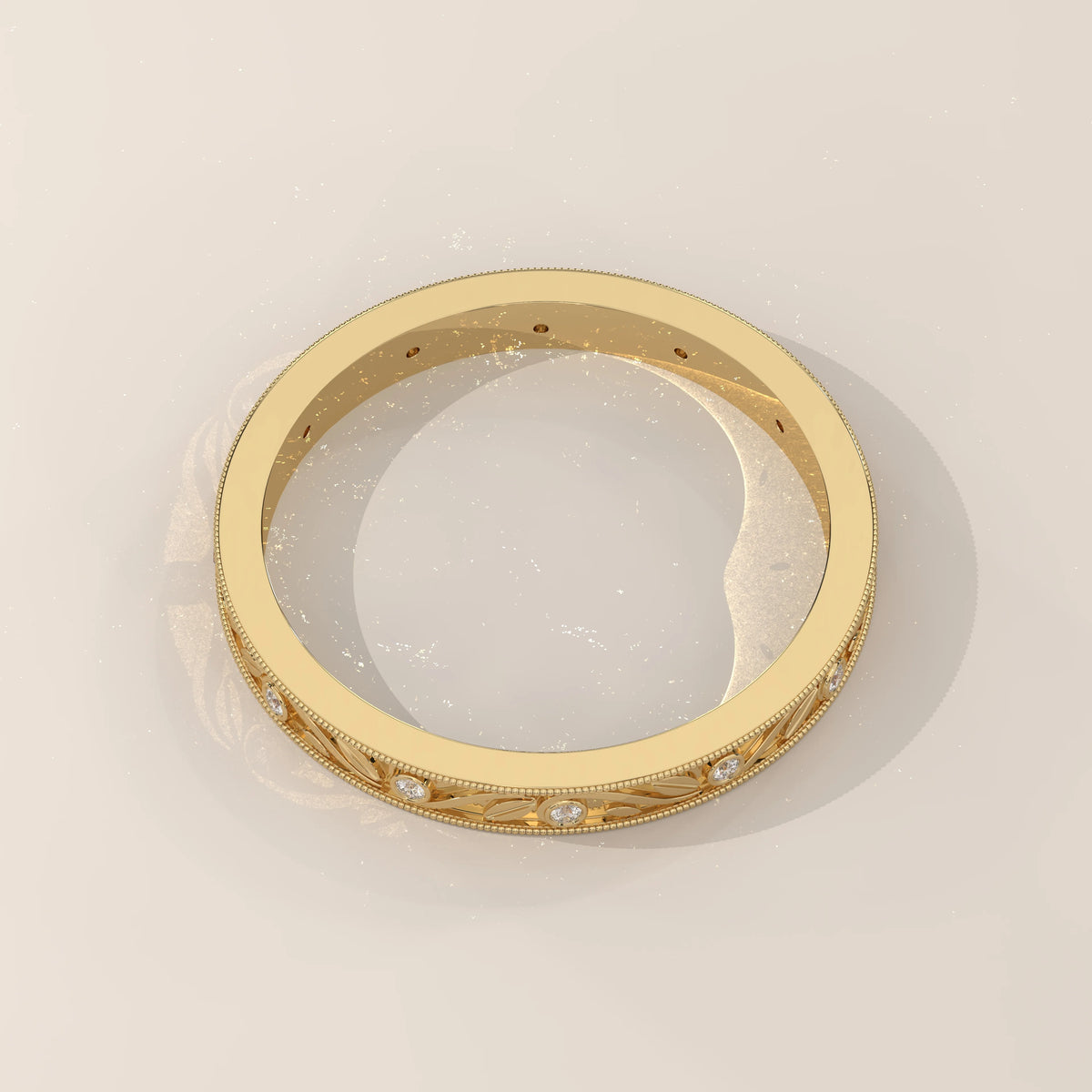 Vintage Engraved Band with Bezel Set Diamond Stations in yellow gold, shown on a plain background.